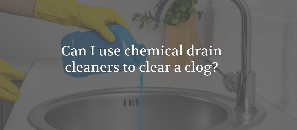 Person pouring chemical drain cleaner into a kitchen sink drain