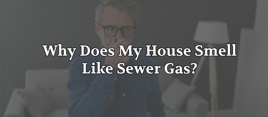 Man covering his nose in a home with text reading “Why Does My House Smell Like Sewer Gas?” over the image.