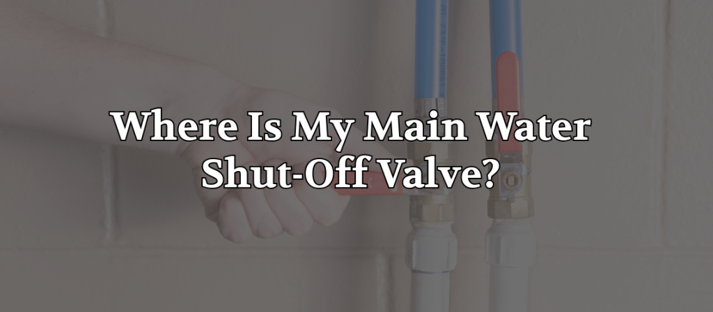 Close-up of a homeowner turning a home's main water shut-off valve connected to blue PEX plumbing lines. The image illustrates how to locate and operate the main water shut-off valve during plumbing emergencies, repairs, or routine maintenance.