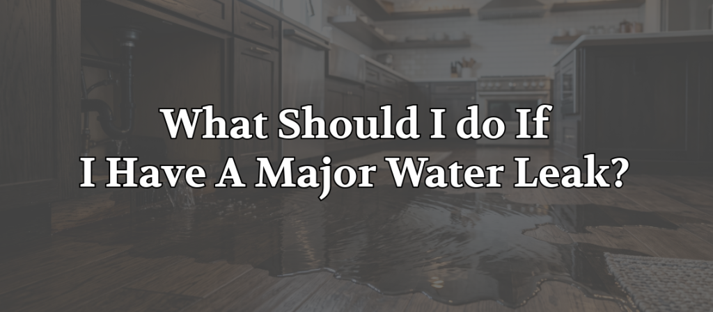 Water leaking across a kitchen floor from beneath a sink, illustrating a major household plumbing leak.